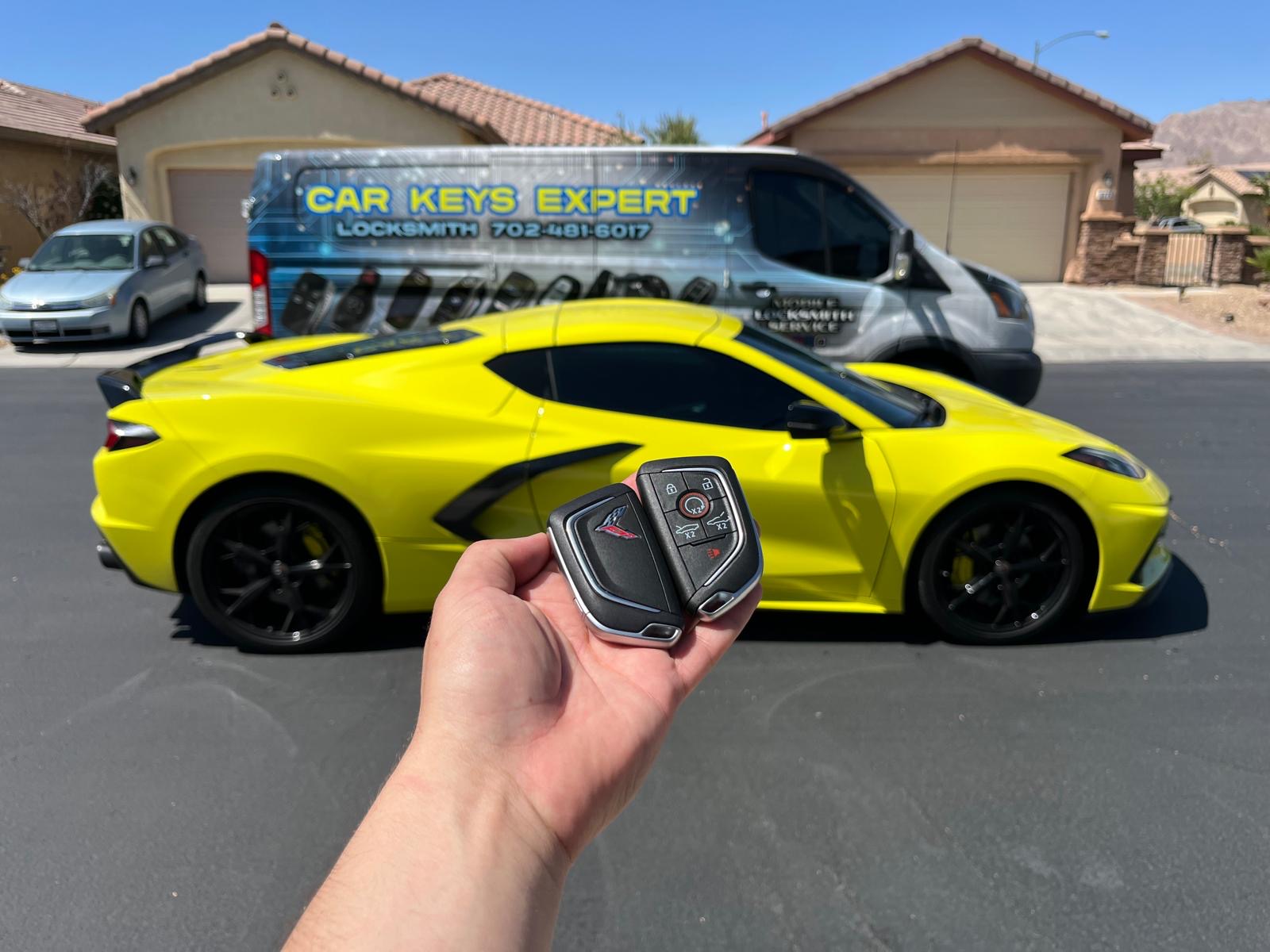 Corvette key with the Car Keys Expert van in the background